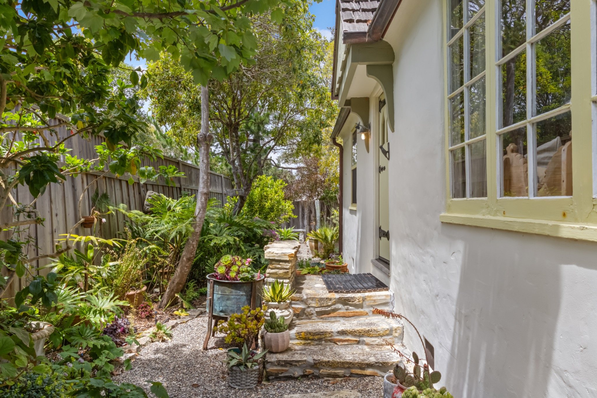 Garden path leading toward Twin Briar Cottage